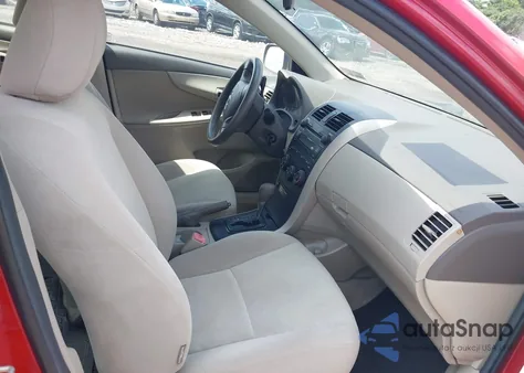 2009 Toyota Corolla Le from USA, damaged, VIN 1NXBU40E39Z070853